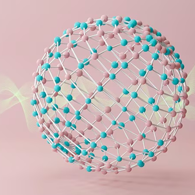 Beaded sphere against a pink background