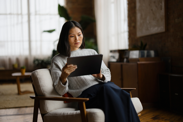 Woman working on tablet