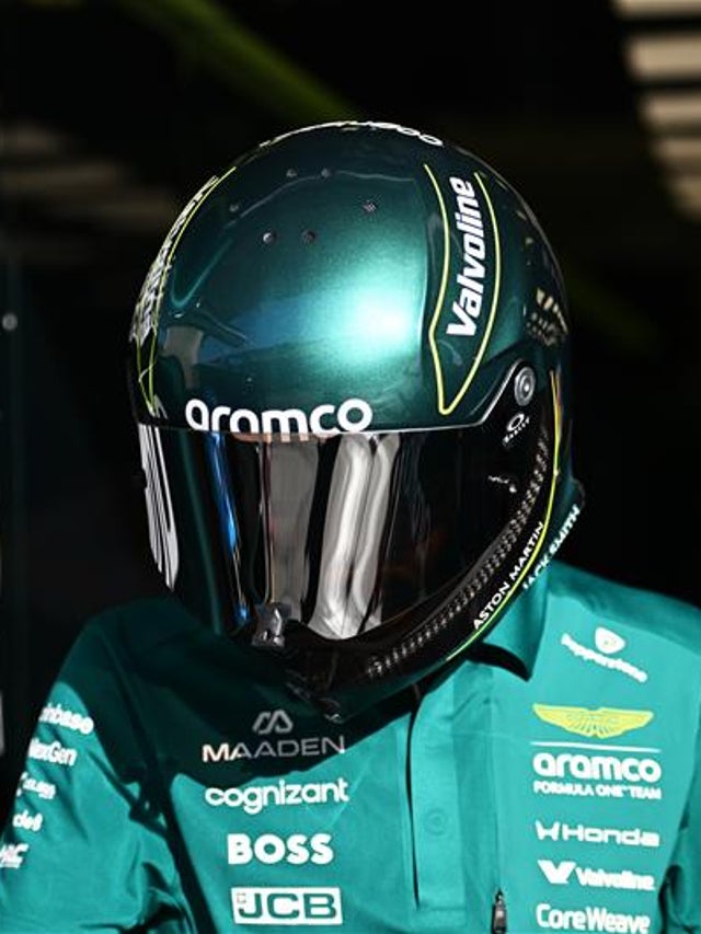 Aston Martin Aramco Formula One driver in a helmet