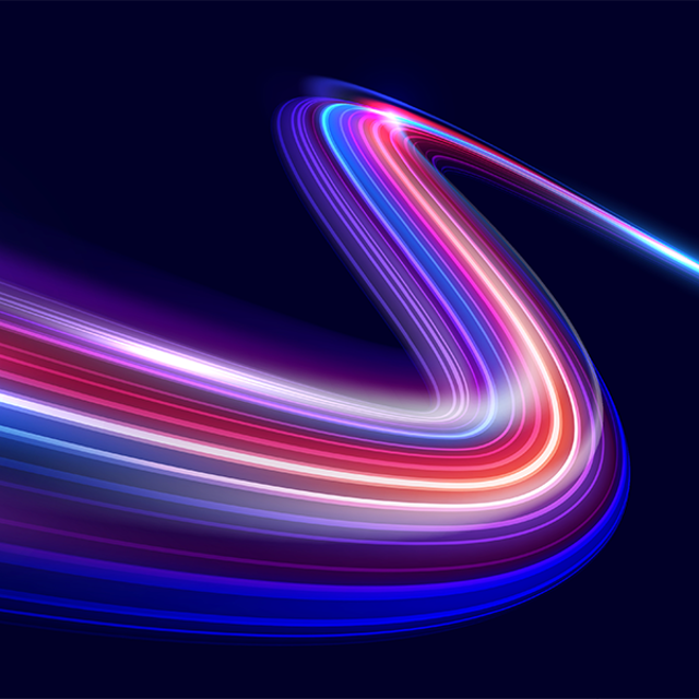 Abstract high-speed movement indicated by motion light trails on a dark blue background 