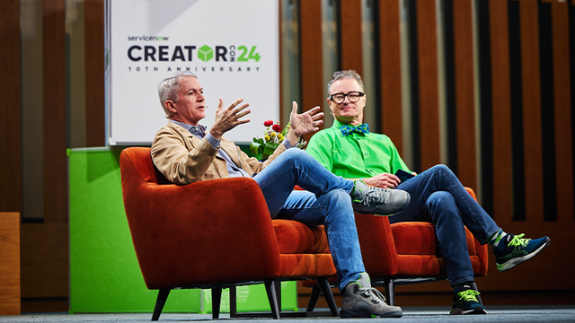 Pat Casey, chief technology officer at ServiceNow, and Chuck Tomasi, senior developer advocate at ServiceNow, speaking at the CreatorCon keynote at Knowledge 2024