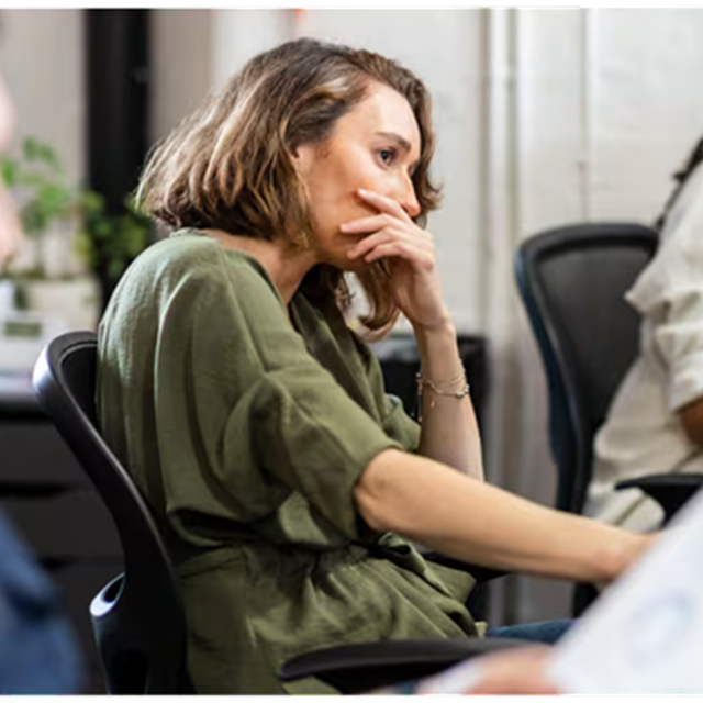 Unhappy worker in an office setting