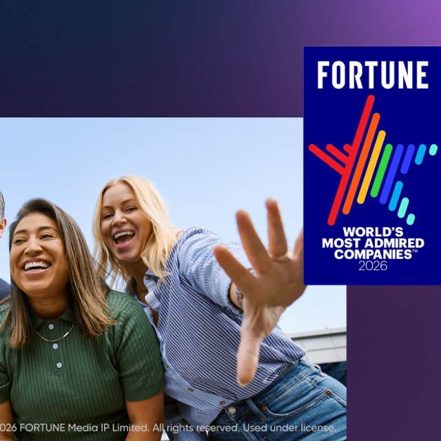 Fortune World’s Most Admired Companies 2026: Three employees in front of a ServiceNow office building