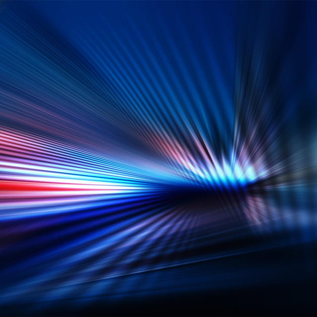 Abstract dark background of light with stripes of colorful rays moving from the center