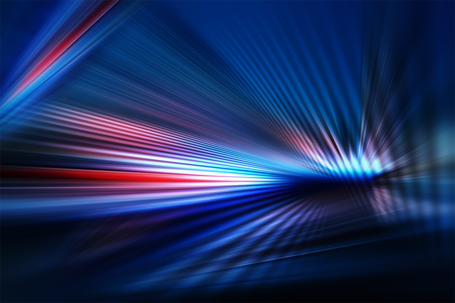 Abstract dark background of light with stripes of colorful rays moving from the center