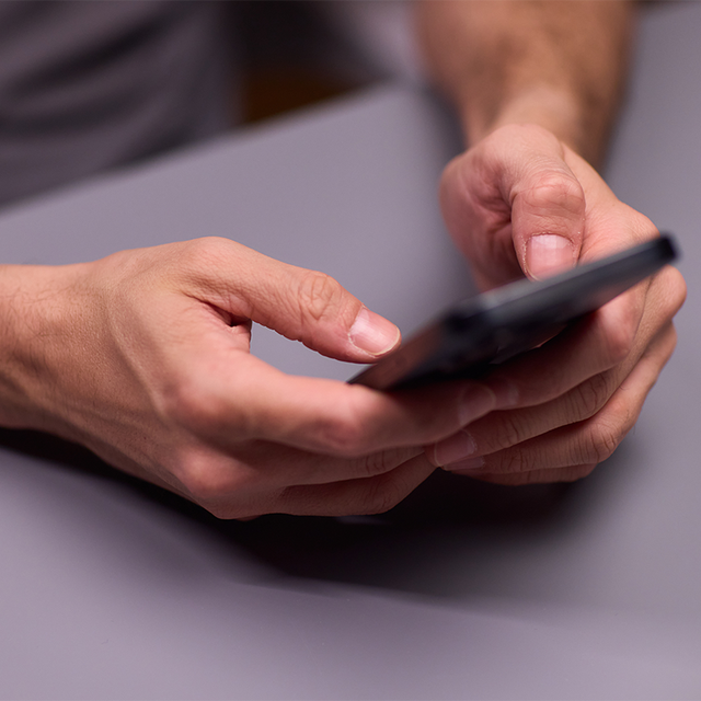 Thumbs texting on a phone