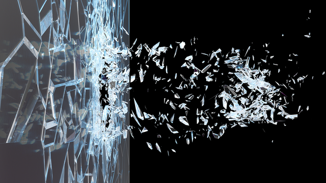 Abstract broken glass shattering into pieces