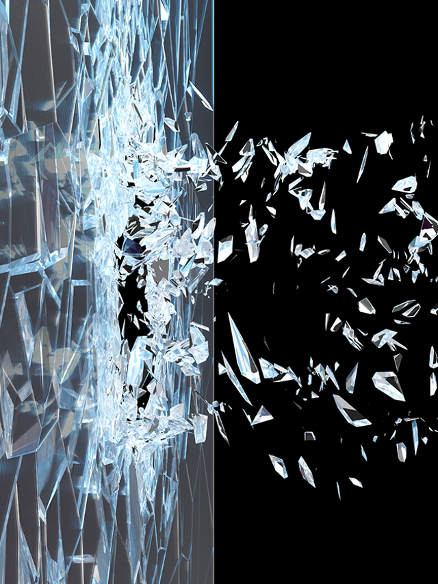 Abstract broken glass shattering into pieces