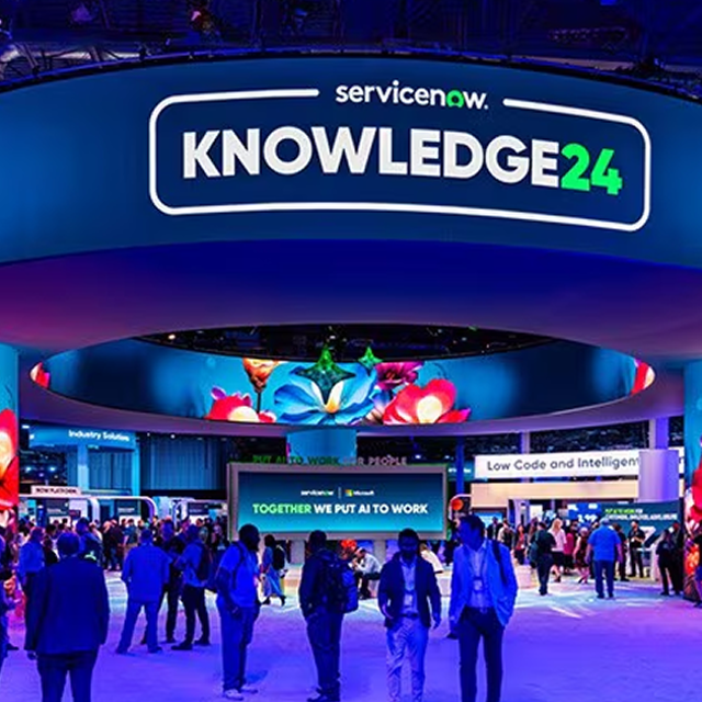 People walking through the Knowledge 2024 expo