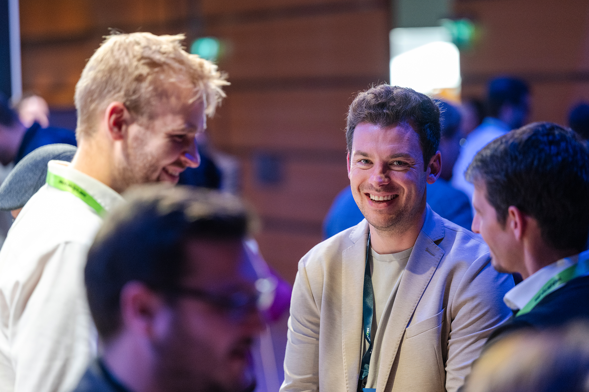 people are talking with each other during event