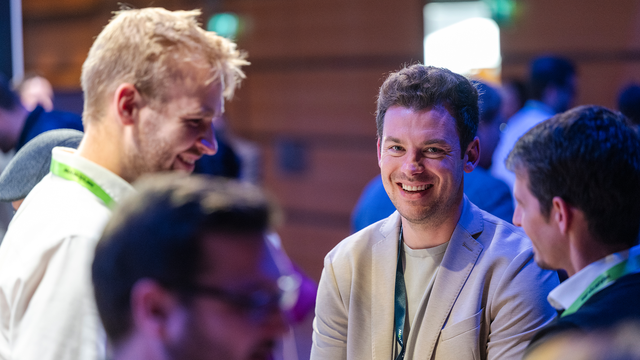 people are talking with each other during event