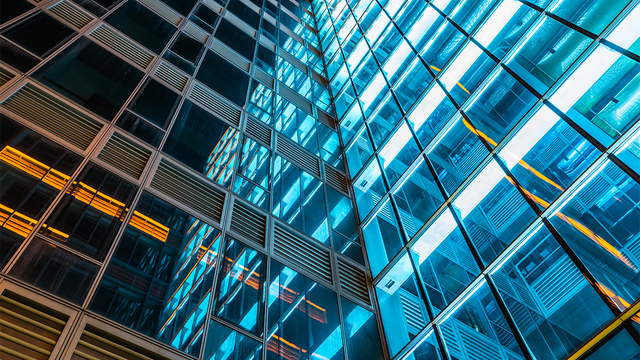 Exterior of a multilevel glass office building