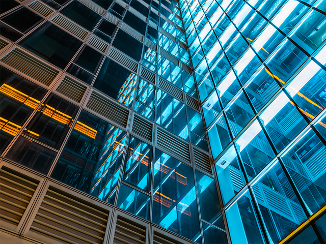 Exterior of a multilevel glass office building