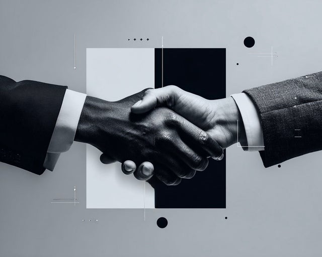 Two hands engaged in a handshake in front of a black and white square