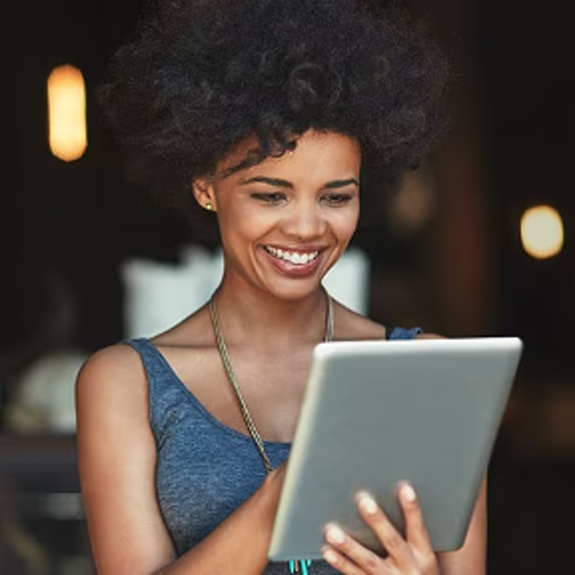Female holding tablet