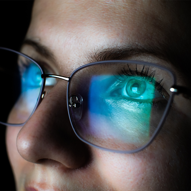 Close-up of a woman's eyes with glasses