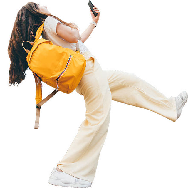 Female carrying backpack walking and leaning back looking phone