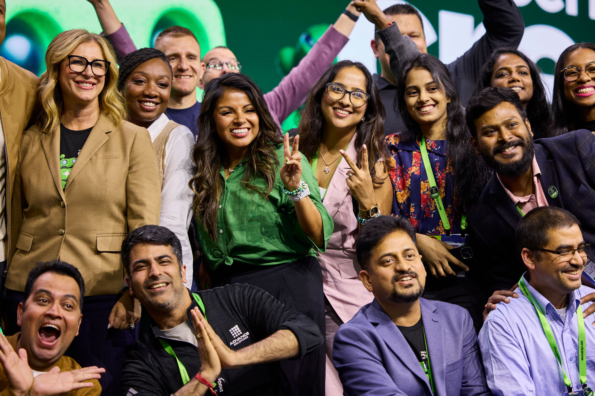 employees are taking photos after event