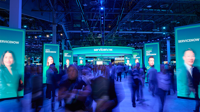 People walking through the ServiceNow Knowledge Expo