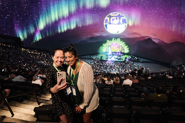 2 women taking a picture inside The Sphere at ServiceNow Knowledge