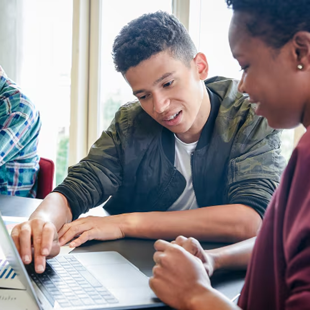Young people participating in a hackathon