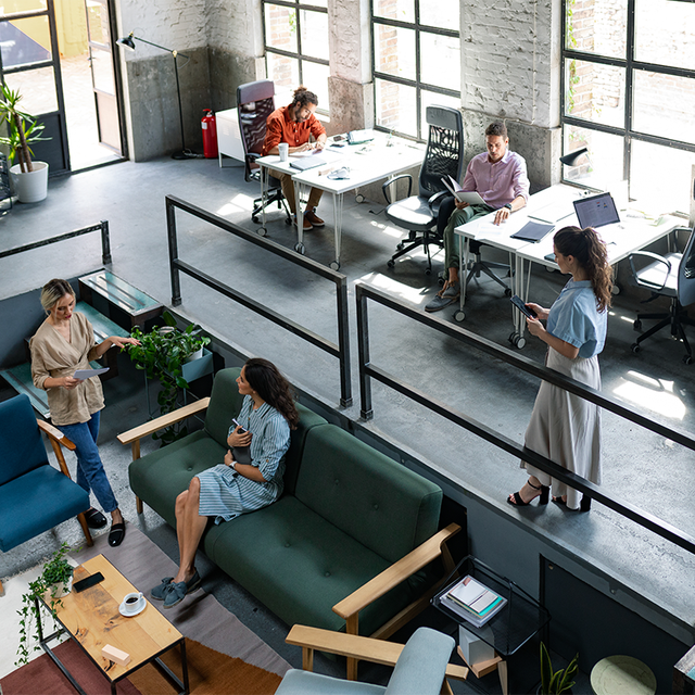 Employees working in a bi-level office