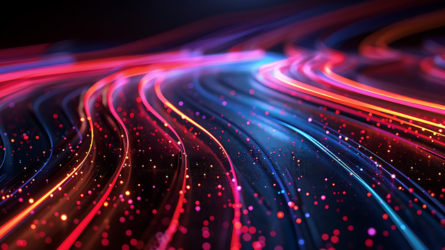 Glowing pink and orange trails of light