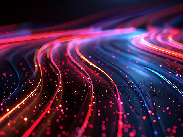 Glowing pink and orange trails of light