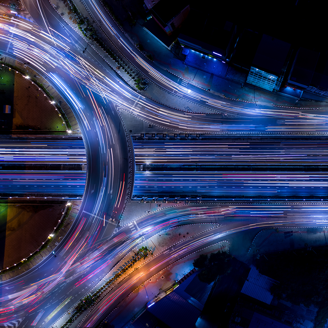 Traffic on a highway network at night with motion blur