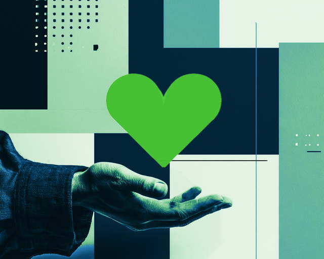 Colorized hand holding a green heart