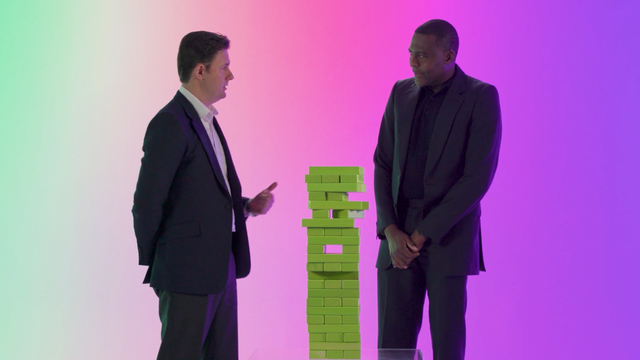 ServiceNow security leaders Ben de Bont and John Aisien playing Jenga