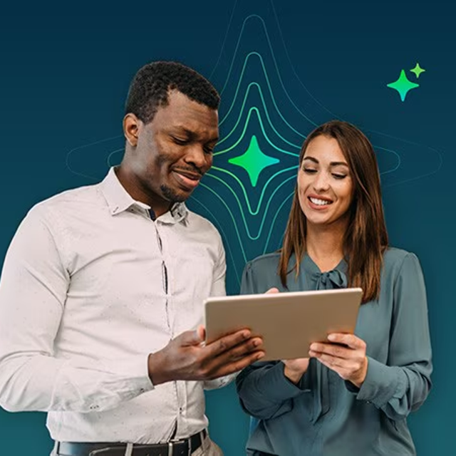 Two people viewing a digital screen with a four-pronged star behind them to indicate AI