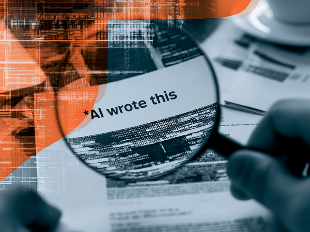 A hand holding a magnifying glass over the words “AI wrote this”