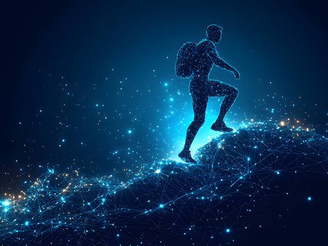 Person climbing up a hill of connected light