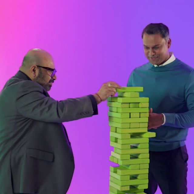 ServiceNow leaders Jithin Bhasker and Sankha Nagchoudhury playing Jenga