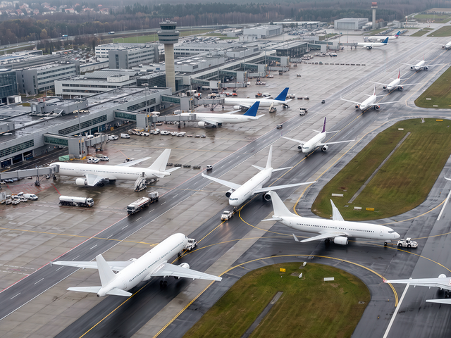 Planes on an airport taxiway