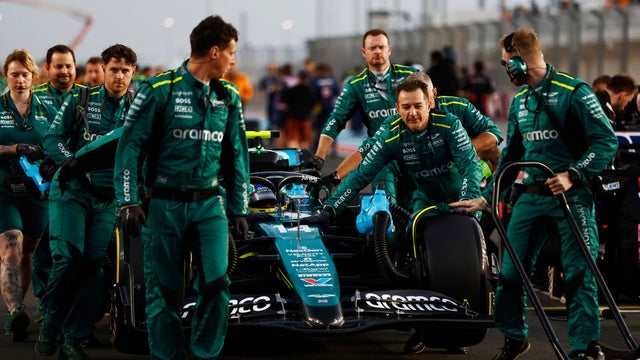 Aston Martin Aramco Formula One Team around the racecar