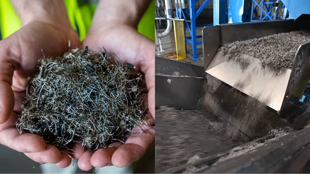 A worker's hands cupping a pile of shredded tire wire fibers recovered during the recycling process.