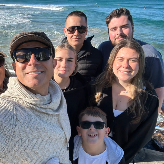 Family photo with beach background