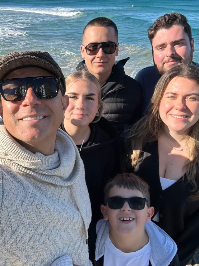 Family photo with beach background