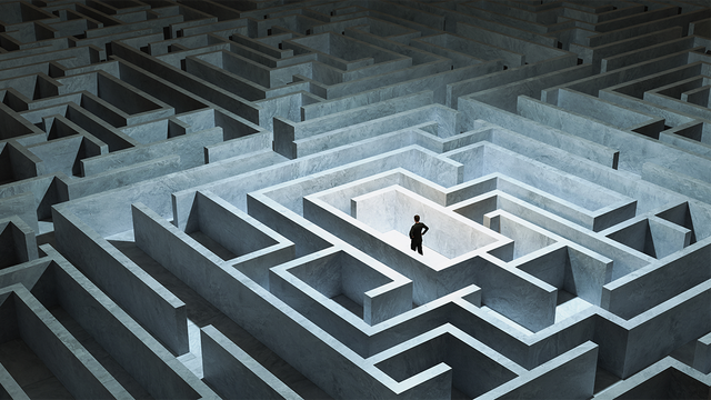 Illustration of a man trapped in the middle of a maze