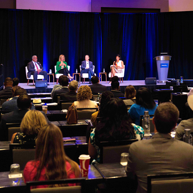 The audience and panel at West Palm Beach