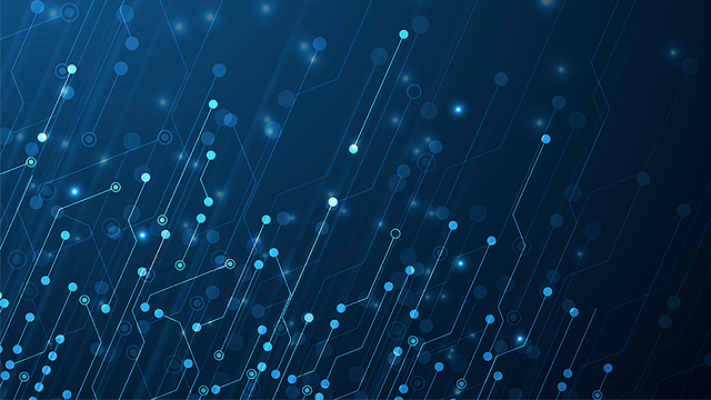 Woman daydreaming in front of an open laptop