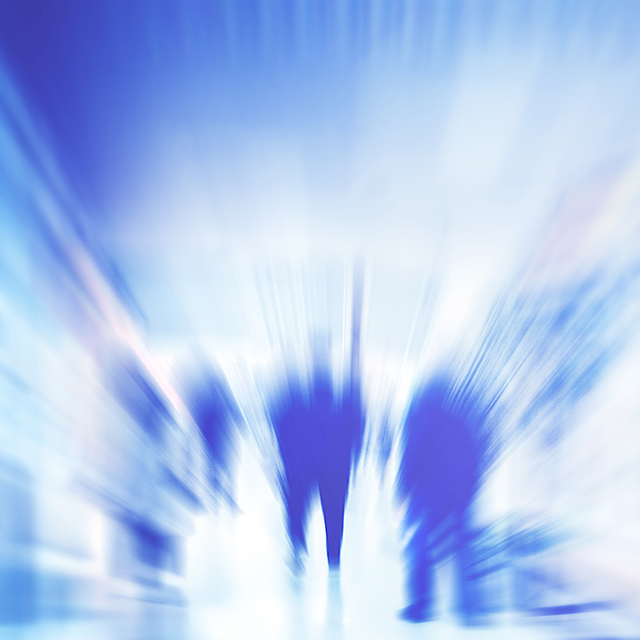 Blurry people walking in abstract