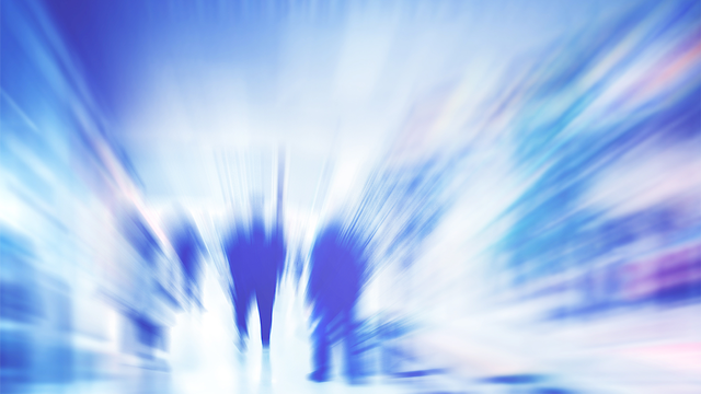 Blurry people walking in abstract