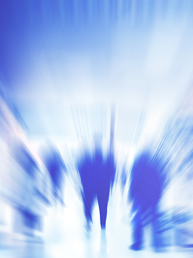 Blurry people walking in abstract